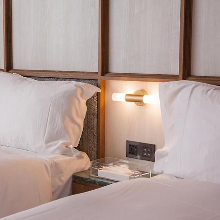 Hotel De Leau Anping Exterior foto A wall-mounted light