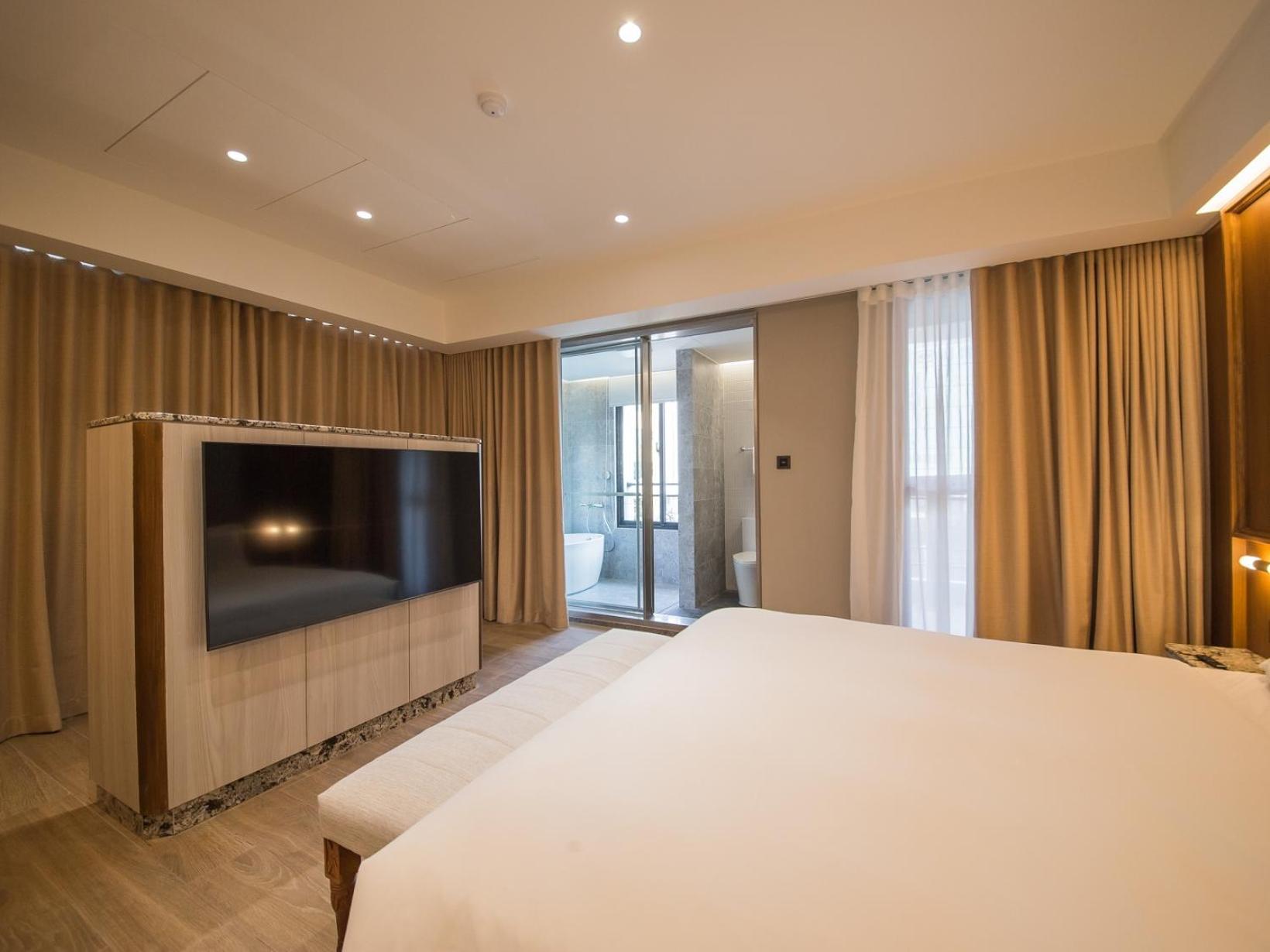 Hotel De Leau Anping Exterior foto A bedroom at the hotel