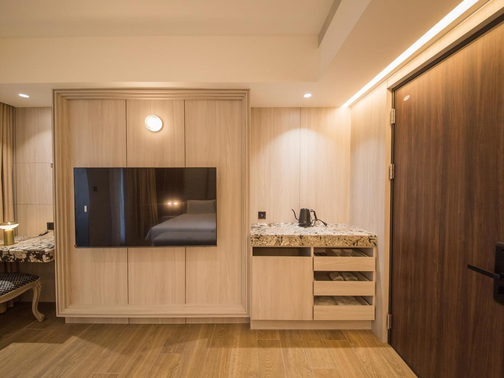 Hotel De Leau Anping Exterior foto A room at the hotel