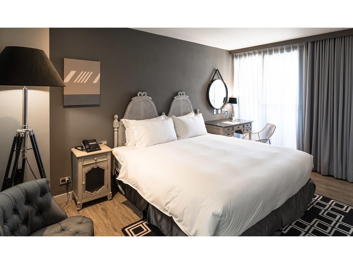 Hotel De Leau Anping Exterior foto A room at the hotel