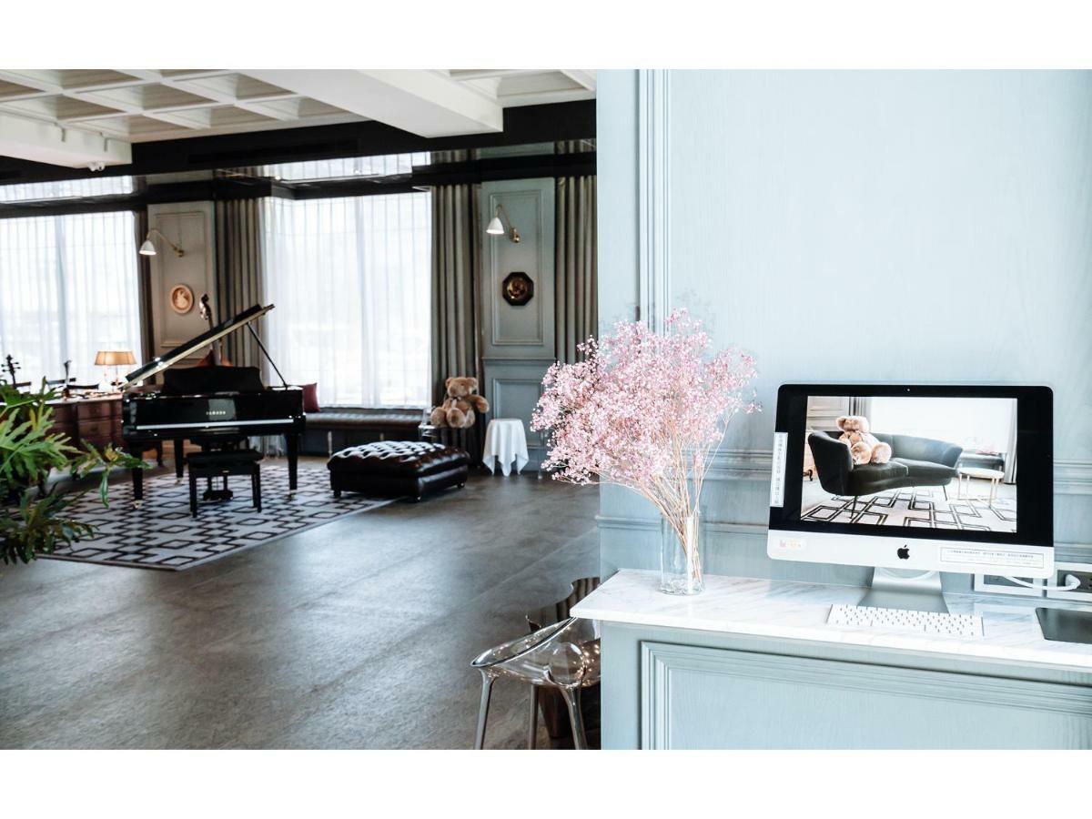Hotel De Leau Anping Exterior foto The interior of the office of the company